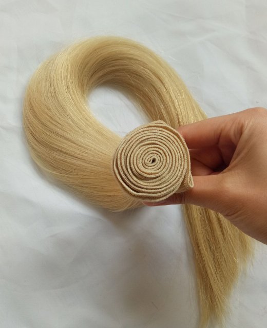 Unprocessed Virgin Human Hair weft light blond 